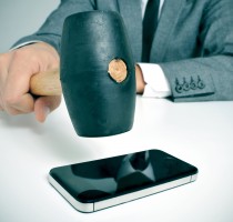 businessman broking a smartphone