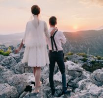 honeymoon wedding couple travel at sunset