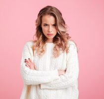 Picture,Of,Angry,Young,Woman,Standing,Isolated,Over,Pink,Background.
