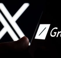 Grok,Ai,Chatbot,Logo,Seen,On,Smartphone,Screen,And,Finger